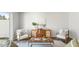 Comfortable living room features designer-selected furniture, neutral paint, stylish decor, and lots of natural light at 137 Yarrow Way, Moncks Corner, SC 29461