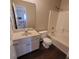 Bathroom with tan walls, vanity, toilet, and tub with shower at 1391 Center Lake Dr, Mount Pleasant, SC 29464