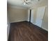 This is an empty bedroom with wood-look floors, a closet, and a ceiling fan at 1391 Center Lake Dr, Mount Pleasant, SC 29464