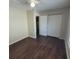 This bedroom features hardwood floors and a closet at 1391 Center Lake Dr, Mount Pleasant, SC 29464