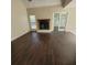 Bright living room with fireplace, hardwood floors, and lots of space for relaxation and entertaining at 1391 Center Lake Dr, Mount Pleasant, SC 29464