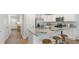 Bright kitchen with stainless appliances, granite counters, and breakfast bar with seating at 141 Yarrow Way, Moncks Corner, SC 29461