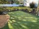 Backyard featuring a putting green and sand trap for outdoor fun at 1414 N Sherwood Dr, Charleston, SC 29407