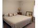 Well-lit bedroom with a comfortable bed, soft pillows, and warm lighting at 1414 N Sherwood Dr, Charleston, SC 29407