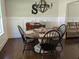 Inviting dining room with a wooden table, elegant chandelier, and a classic, refined ambiance at 1414 N Sherwood Dr, Charleston, SC 29407