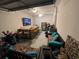 Spacious garage converted into a recreational space with a bar and lounge area at 1414 N Sherwood Dr, Charleston, SC 29407