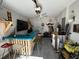 Entertaining garage has custom bar, television, and overhead storage in this flexible space at 1414 N Sherwood Dr, Charleston, SC 29407