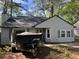 Charming one-story home with a well-maintained exterior and a lush, green lawn at 143 Mickler Dr, Ladson, SC 29456