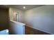 Hallway with neutral walls and carpet with a view into another room at 145 Yarrow Way, Moncks Corner, SC 29461