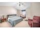 Bright bedroom with vaulted ceilings, a ceiling fan, and a cozy sitting area for relaxing at 155 Winding River Dr, Johns Island, SC 29455