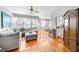 Bright living room featuring hardwood floors and a comfortable gray sectional sofa at 155 Winding River Dr, Johns Island, SC 29455