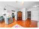 Open concept living space showcasing hardwood floors, decorative furniture, and a cozy atmosphere at 155 Winding River Dr, Johns Island, SC 29455