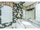 Bathroom boasting patterned wallpaper, granite countertops, and natural light from shuttered windows at 177 Thousand Oaks Cir, Goose Creek, SC 29445