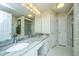 Bathroom features dual sinks, granite countertops, and a large framed mirror at 177 Thousand Oaks Cir, Goose Creek, SC 29445