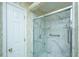 Elegant bathroom showcases a glass-enclosed shower with marble-like walls and sleek hardware at 177 Thousand Oaks Cir, Goose Creek, SC 29445