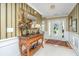 Elegant foyer featuring a decorative mirror, hardwood floors, and a stylish console table at 177 Thousand Oaks Cir, Goose Creek, SC 29445