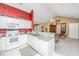 Bright kitchen featuring white cabinets, granite countertops, and a breakfast bar at 177 Thousand Oaks Cir, Goose Creek, SC 29445