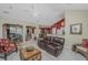 Spacious living room with comfortable seating, open to the dining area and kitchen for easy entertaining at 177 Thousand Oaks Cir, Goose Creek, SC 29445