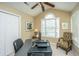Inviting home office space with vaulted ceilings, lots of natural light, and plenty of work space at 177 Thousand Oaks Cir, Goose Creek, SC 29445