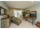 This office space offers a comfortable armchair, natural light and built in storage at 177 Thousand Oaks Cir, Goose Creek, SC 29445