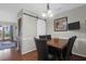 Dining room with a wooden table and chairs, complete with decor for a cozy atmosphere at 2 Townpark Ln # D, Charleston, SC 29412