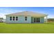 Backyard showing patio and large lawn at 202 Bilge Rd, Ridgeville, SC 29472