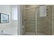 Bright bathroom features soaking tub and walk-in shower with tile surround at 202 Bilge Rd, Ridgeville, SC 29472