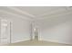 A bright bedroom features a tray ceiling and an ensuite bathroom at 202 Bilge Rd, Ridgeville, SC 29472