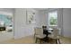 Open dining area features modern decor and lots of natural light at 202 Bilge Rd, Ridgeville, SC 29472