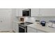 Clean, bright kitchen featuring white cabinets, light countertops, and stainless steel oven at 202 Bilge Rd, Ridgeville, SC 29472