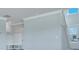Bright foyer area with stairway, coat rack and storage, and door to the outside offering seamless transition at 203 Bilge Rd, Ridgeville, SC 29472
