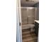 Clean bathroom featuring gray cabinetry and shower-tub combo at 203 Oakmont Ave # B, Ladson, SC 29456