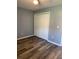 Bedroom with double closet doors and ceiling fan at 203 Oakmont Ave # B, Ladson, SC 29456