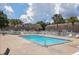 Inviting community pool with clear blue water, surrounded by lounge chairs at 203 Oakmont Ave # B, Ladson, SC 29456