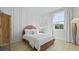 Bedroom with paneling and a window at 206 Bilge Rd, Ridgeville, SC 29472