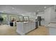 Contemporary kitchen with an island, stainless steel appliances, and an open floor plan at 206 Bilge Rd, Ridgeville, SC 29472