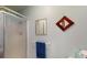 Bright bathroom featuring a shower, framed mirrors, and towel rack at 2071 Middleburg Ln, Mount Pleasant, SC 29464