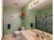 Bathroom showcases a vanity, framed mirror, toilet, and vibrant shower curtain at 2071 Middleburg Ln, Mount Pleasant, SC 29464