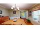 Traditional dining room featuring hardwood floors, a chandelier, and natural light at 2071 Middleburg Ln, Mount Pleasant, SC 29464