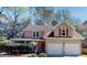 Charming two-story home with attached two-car garage and inviting front porch at 2071 Middleburg Ln, Mount Pleasant, SC 29464