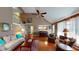Spacious living room featuring hardwood floors, a fireplace, and stairs to upper level at 2071 Middleburg Ln, Mount Pleasant, SC 29464
