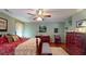 Comfortable main bedroom featuring a ceiling fan, sitting area, and attractive wood furnishings at 2071 Middleburg Ln, Mount Pleasant, SC 29464