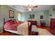 Comfortable main bedroom featuring a ceiling fan, sitting area, and attractive wood furnishings at 2071 Middleburg Ln, Mount Pleasant, SC 29464