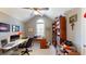 Well-lit home office boasts a vaulted ceiling, built-in bookcase, and bright window at 2071 Middleburg Ln, Mount Pleasant, SC 29464