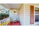Covered porch featuring a round window and space for seating, perfect for relaxing at 2071 Middleburg Ln, Mount Pleasant, SC 29464