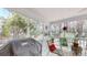 Screened-in porch with grill offers a great space for outdoor dining and relaxing at 2071 Middleburg Ln, Mount Pleasant, SC 29464