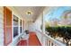 Inviting front porch with cozy seating offers a charming outdoor space at 2071 Middleburg Ln, Mount Pleasant, SC 29464