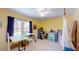 Sunny spare bedroom featuring ample space, a ceiling fan, and a large window at 2071 Middleburg Ln, Mount Pleasant, SC 29464