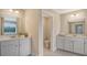 Bright bathroom featuring double vanities with neutral countertops and modern fixtures plus a separate toilet room at 210 Bilge Rd, Ridgeville, SC 29472