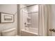 Neutral bathroom featuring tub/shower combination with white tub and tile surround at 210 Bilge Rd, Ridgeville, SC 29472